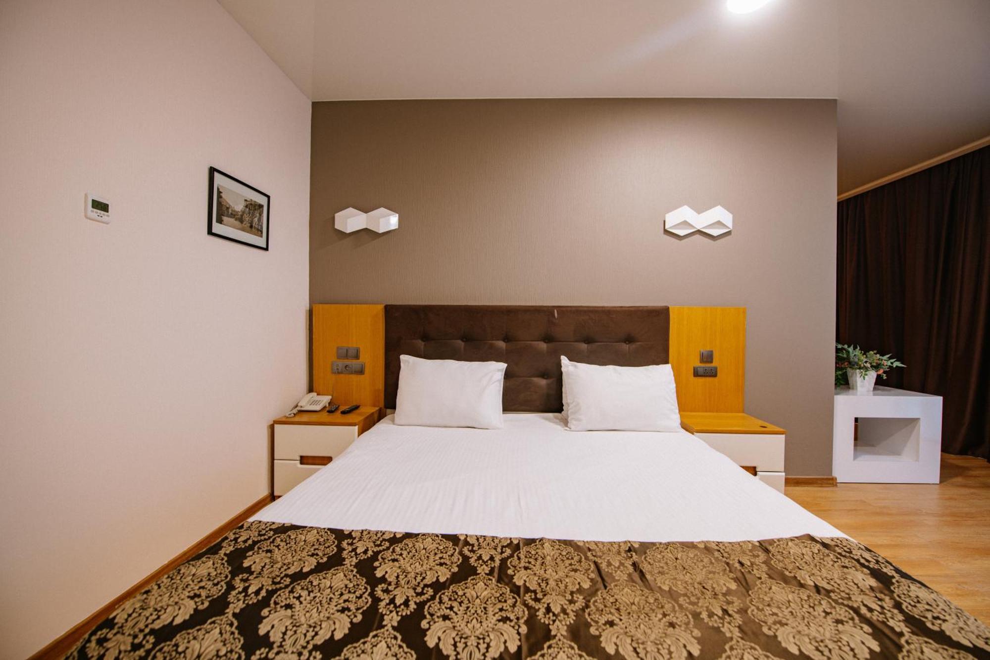 Iveria Inn Hotel Tiflis Habitación foto