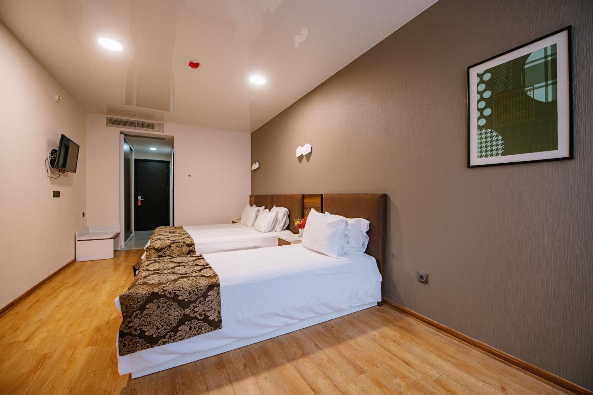 Iveria Inn Hotel Tiflis Habitación foto