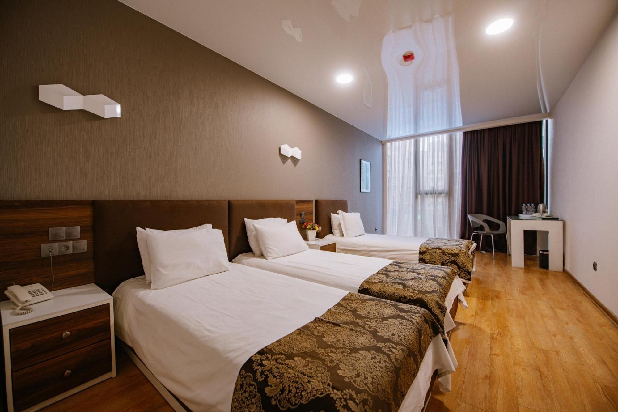 Iveria Inn Hotel Tiflis Habitación foto