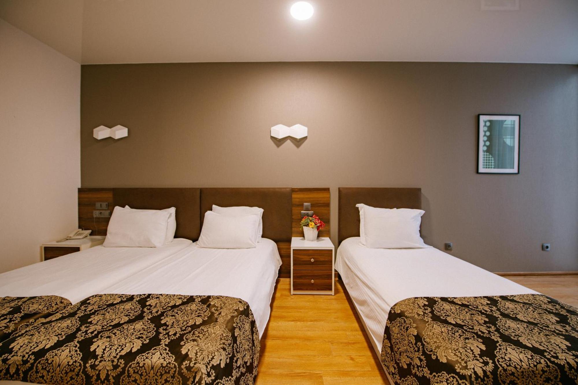 Iveria Inn Hotel Tiflis Habitación foto
